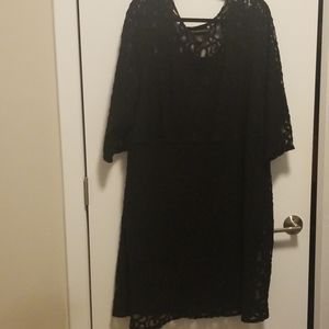 Black dress with sheer design.